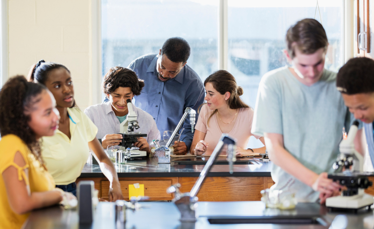 Students working in science classroom